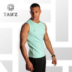 Man wearing mint sleeveless athletic tank top side view